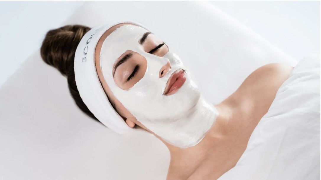 Guest receiving the Oxygenating and D-Tox facial mask treatment